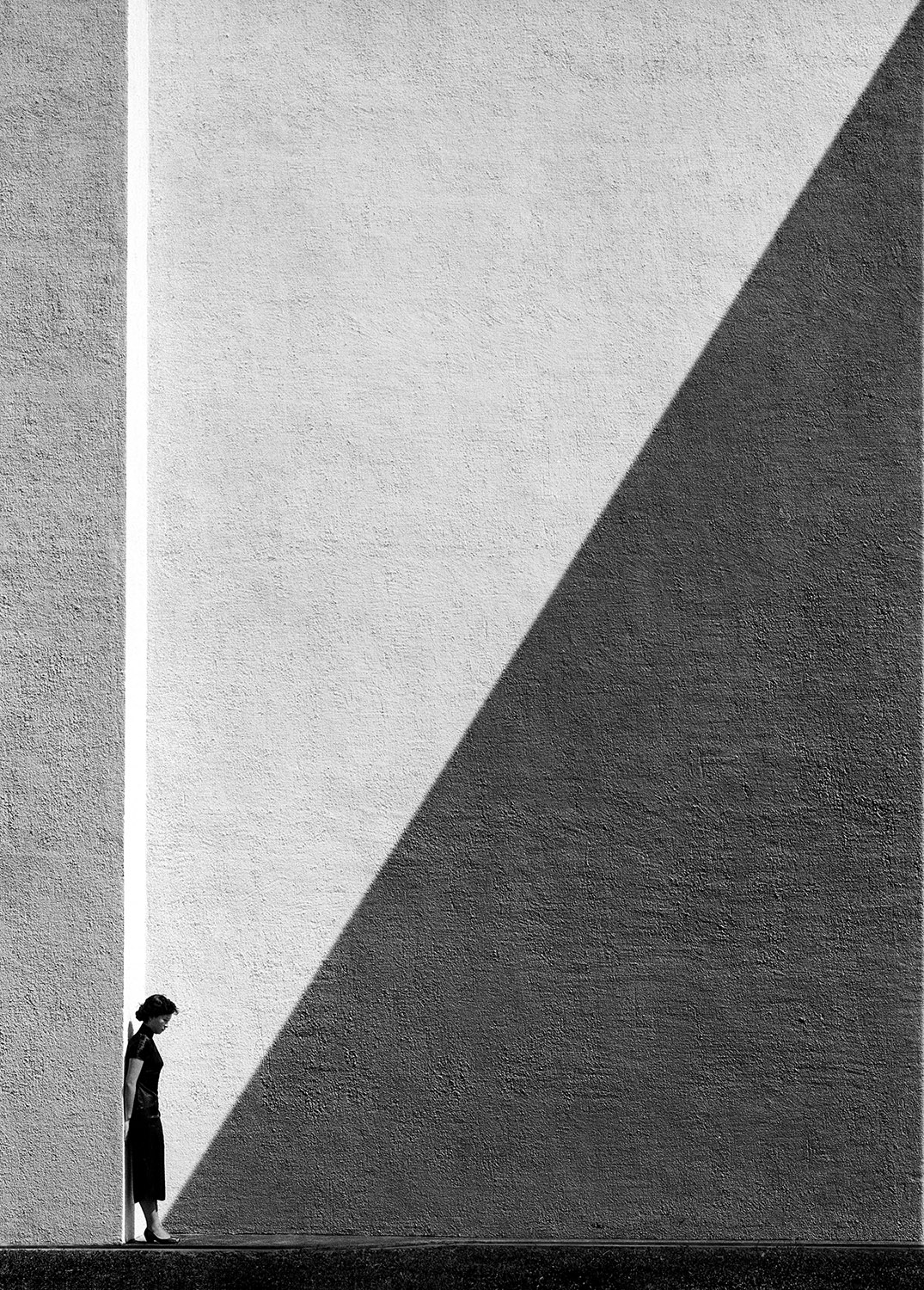 Fan Ho 何藩 Approaching Shadow (陰影) Hong Kong 1954 courtesy of Blue Lotus Gallery - Fan Ho - Photography. My Passion. My Life |  - Fan Ho - Photography. My Passion. My Life