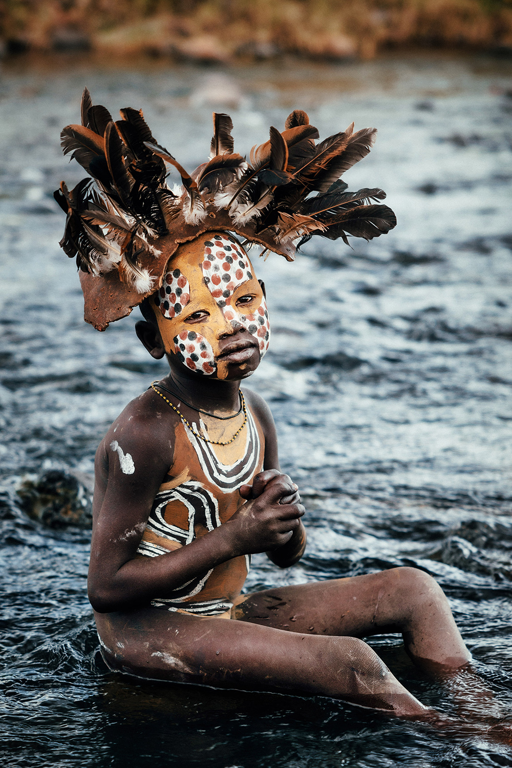 Andrew Eldon Suri Boy in River Omo Valey Ethiopia 2023 Courtesy of Blue Lotus Gallery - Tribe Blue Lotus |  - 'TRIBE' at Blue Lotus Gallery Hong Kong