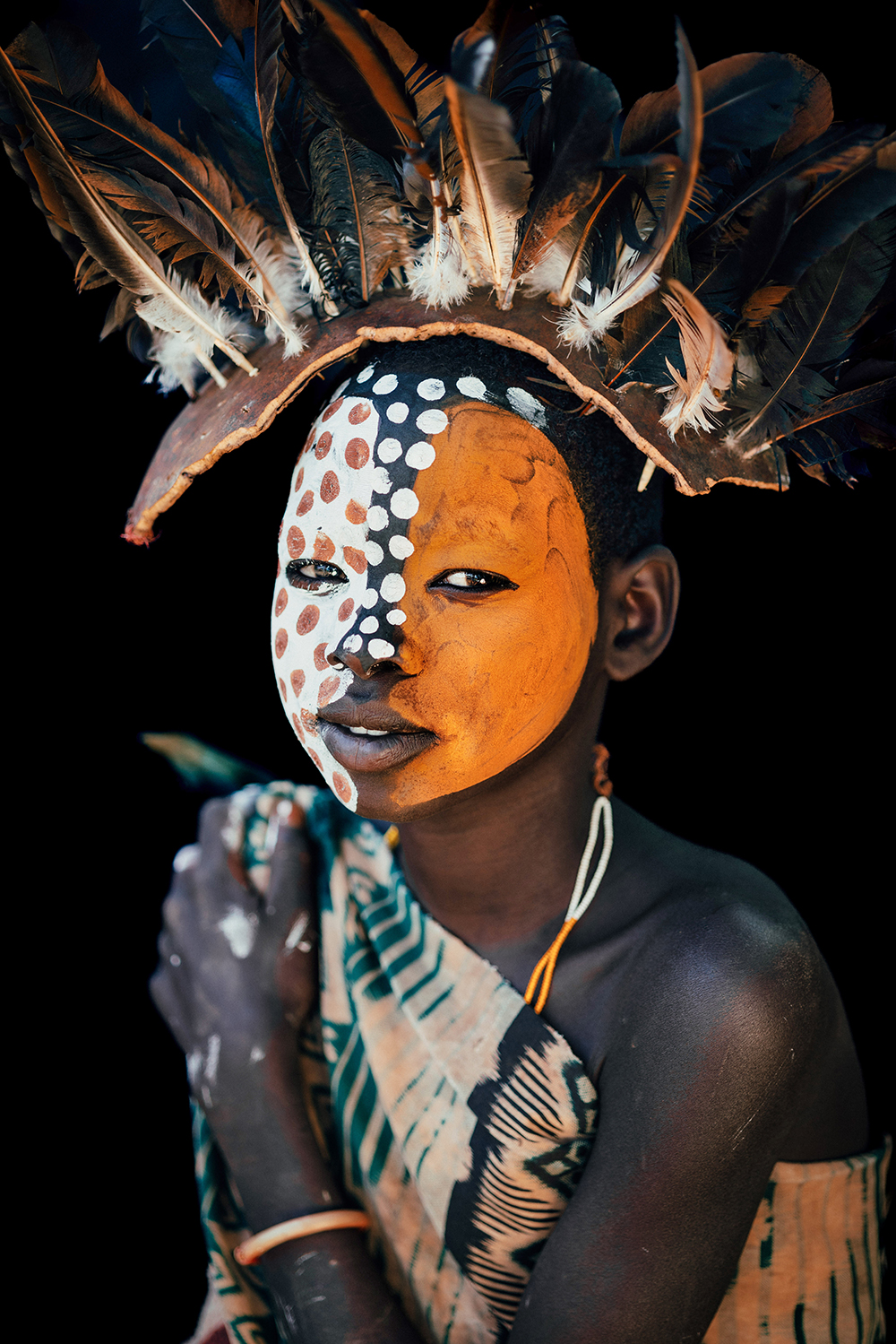 Andrew Eldon Suri Girl in Feather Headress Omo Valey Ethiopia 2023 Courtesy of Blue Lotus Gallery - Tribe Blue Lotus |  - 'TRIBE' at Blue Lotus Gallery Hong Kong