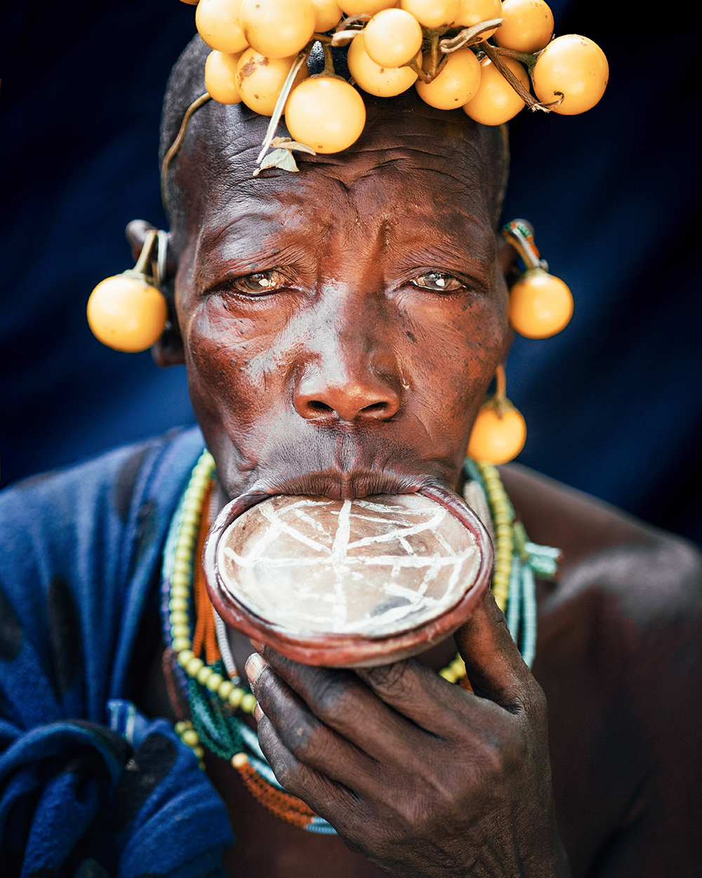 Andrew Eldon Suri Matriarch with Lip Plate Omo Valey Ethiopia 2023 Courtesy of Blue Lotus Gallery - Tribe Blue Lotus |  - 'TRIBE' at Blue Lotus Gallery Hong Kong
