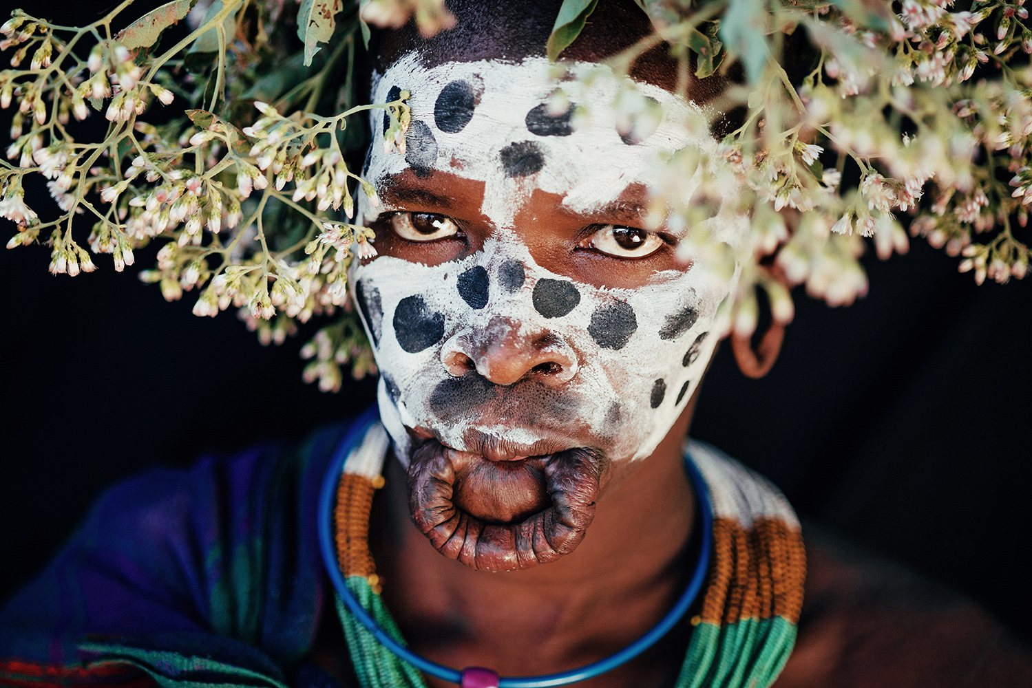 Andrew Eldon Suri Woman with Open Lip 1 Omo Valey Ethiopia 2023 Courtesy of Blue Lotus Gallery - Tribe Blue Lotus |  - 'TRIBE' at Blue Lotus Gallery Hong Kong
